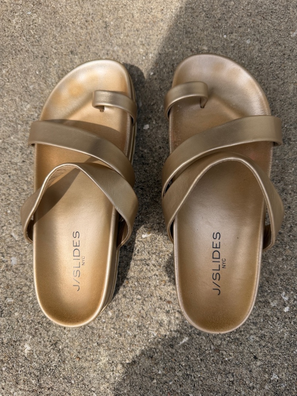 J/SLIDES Metallic Bronze Crisscross Toe-Loop Slide Sandals